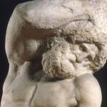 el Esclavo Barbudo (también conocido como Prisionero Barbudo), una escultura de mármol inacabada del artista renacentista Miguel Ángel.